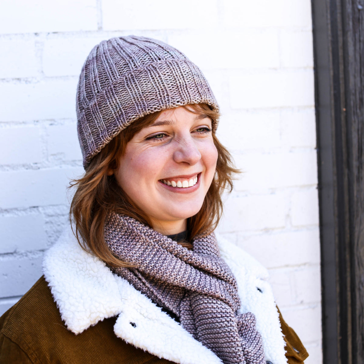 Woman in grey ribbed beanie hat